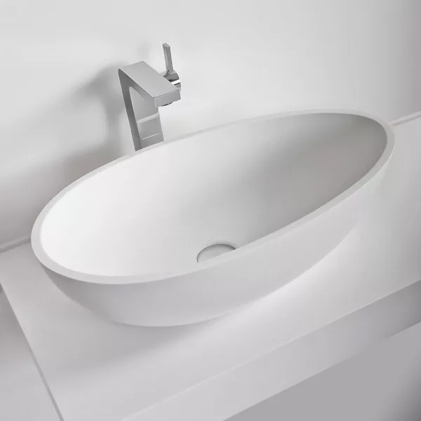 Vasque à poser en Solid Surface de 60 x 35 x 16 cm, finition mate, résistante aux tâches et à l'humidité, avec une bonde pop-up en laiton chromé, idéale pour un entretien facile, disponible à l'achat avec livraison.