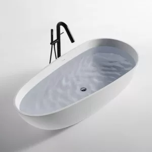 Baignoire îlot COCOON 140 MATE en Solid Surface, de dimensions 140 x 76 x 54(h) cm, fabriquée en matériau monobloc résistant aux tâches et à l'humidité, offrant une surface agréable au toucher, avec siphon et flexible inclus, ainsi qu'un trop-plein.